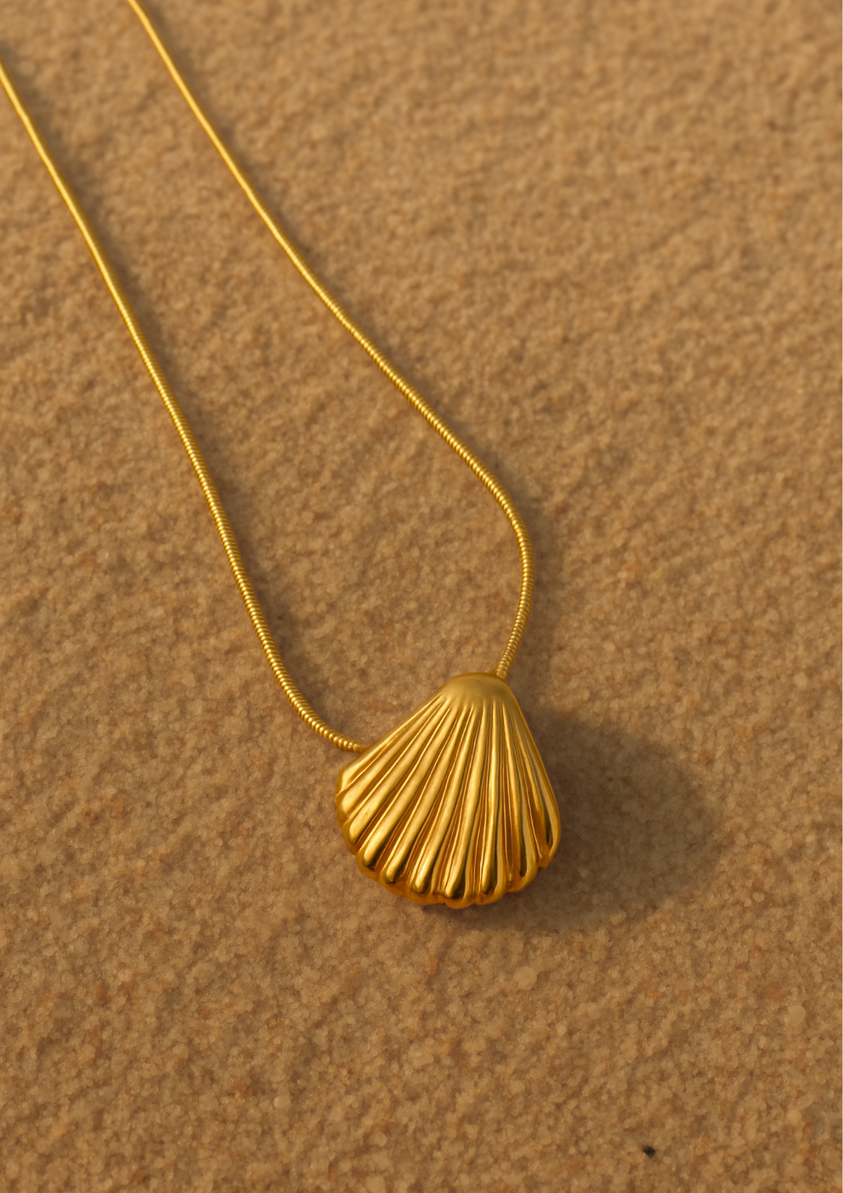 Seoraa Jewels Ocean Whisper Pendant – Anti tarnish gold plated seashell pendant on dainty chain, waterproof trendy statement jewellery for everyday wear and layering.