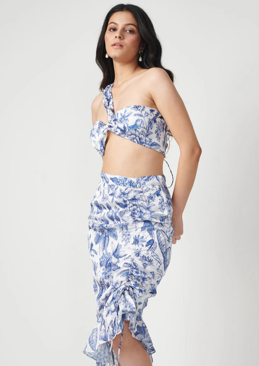 Siora blue and white printed Petal skirt in semi satin georgette with drawstring waist and playful ruffle detailing for casual summer outings.