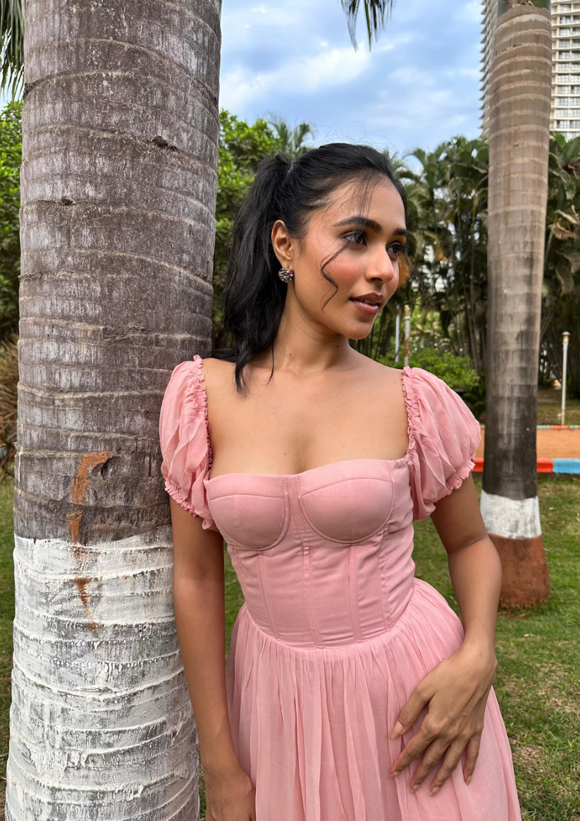 iora elegant red georgette long dress with tiered frills, structured bustier top, and open criss-cross back—ideal for romantic dinners, formal events, or holiday celebrations.