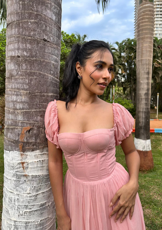 iora elegant red georgette long dress with tiered frills, structured bustier top, and open criss-cross back—ideal for romantic dinners, formal events, or holiday celebrations.