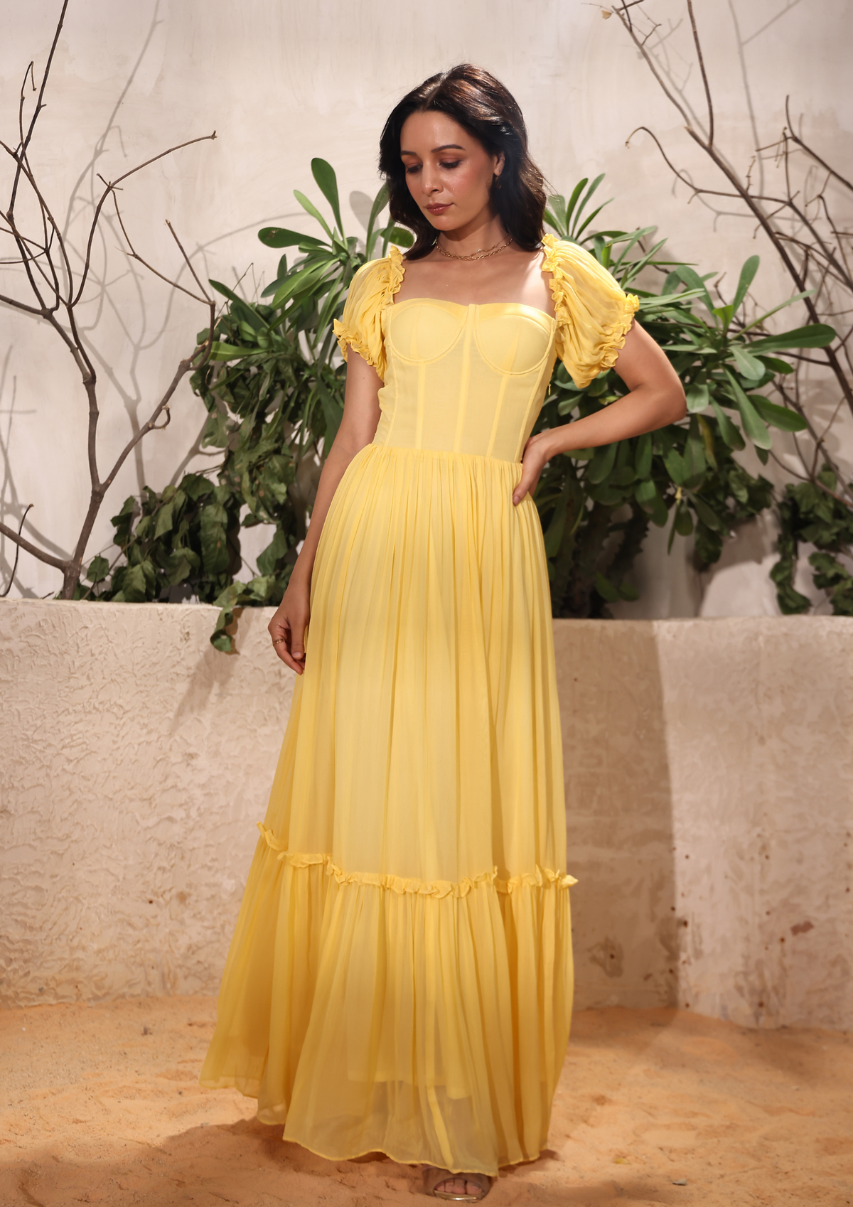 Seeora trendy yellow puff-sleeve gown with a sweetheart neckline, flairy hem, and feminine frills—an exquisite choice for Haldi functions and holiday getaways