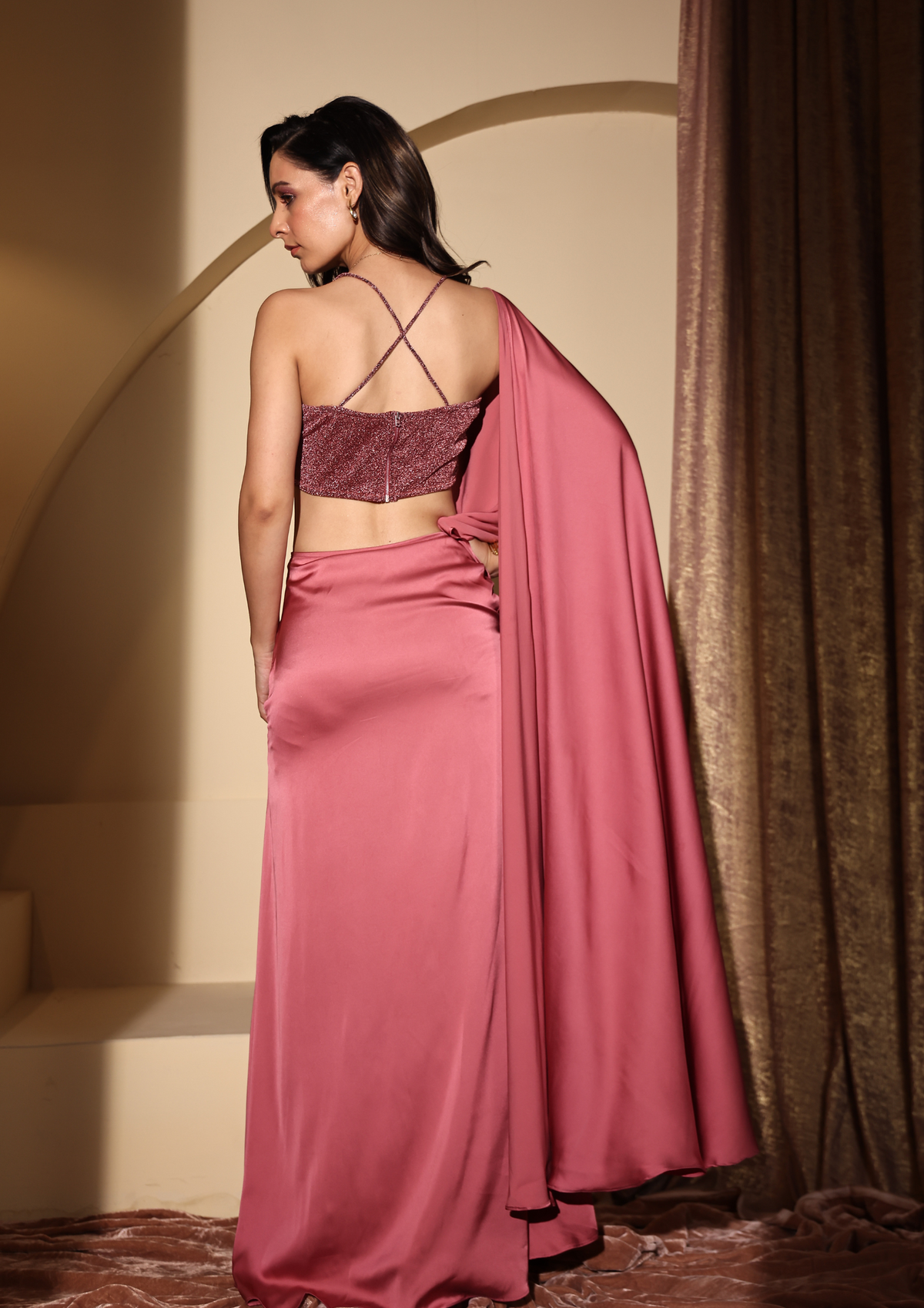 Seeora Luxe elegant yet sexy blush pink Armani silk Aqsa Saree with a slide slit, stringed gathers, and a shimmering sequined blouse—your go-to outfit for festive gatherings, Diwali, and high-end parties