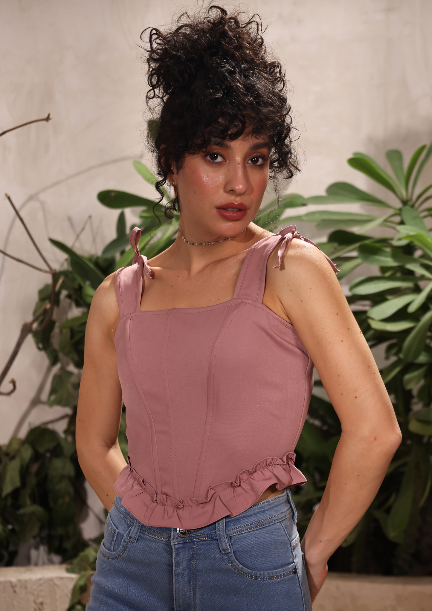 Seeora elegant blush pink corset top with a square neckline, ruffled hem, and a chic crisscross back—your go-to fashion choice for birthdays, dates, and casual events