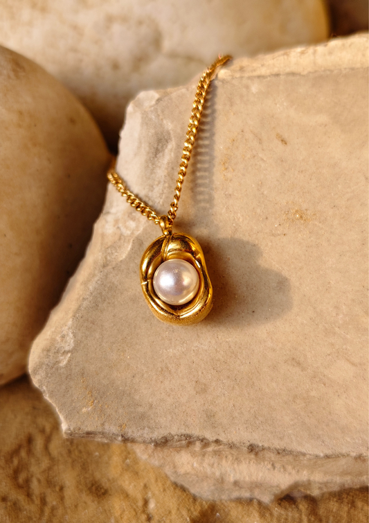 Siora: "Siora Ocean’s Memory Pendant, gold plated and anti tarnish, featuring pearl detail, trendy chains, statement jewellery, perfect for everyday wear."