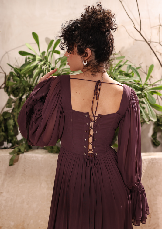 Seora Brown Wine Maxi Gown Dress featuring a flattering fit-and-flare design, flowing tiered skirt, and delicate button accents – ideal for bridesmaids, upscale events, and evening celebrations.