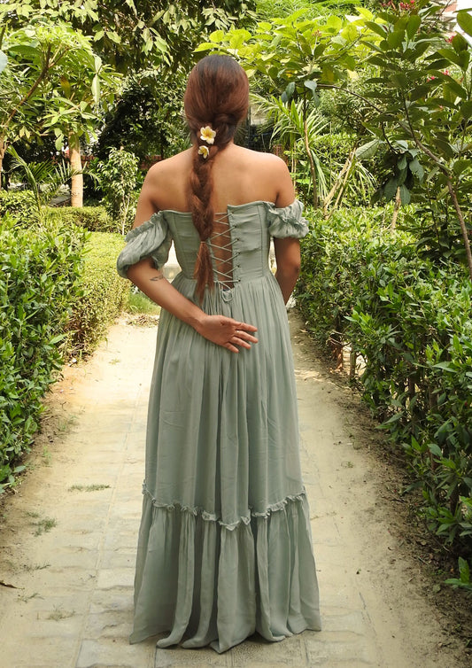 Siora Seafoam Green Georgette Dress – flowy bustier-style gown with puff sleeves, tie-back detail, and a romantic silhouette for brunches or beach weddings.