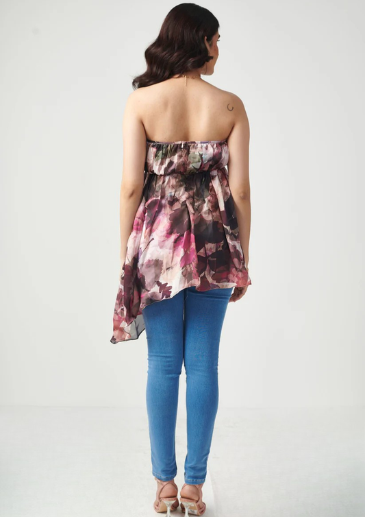 Siora flirty floral semi satin georgette summer top with romantic off-shoulder neckline and playful asymmetric hem—ideal for date days and travel looks.