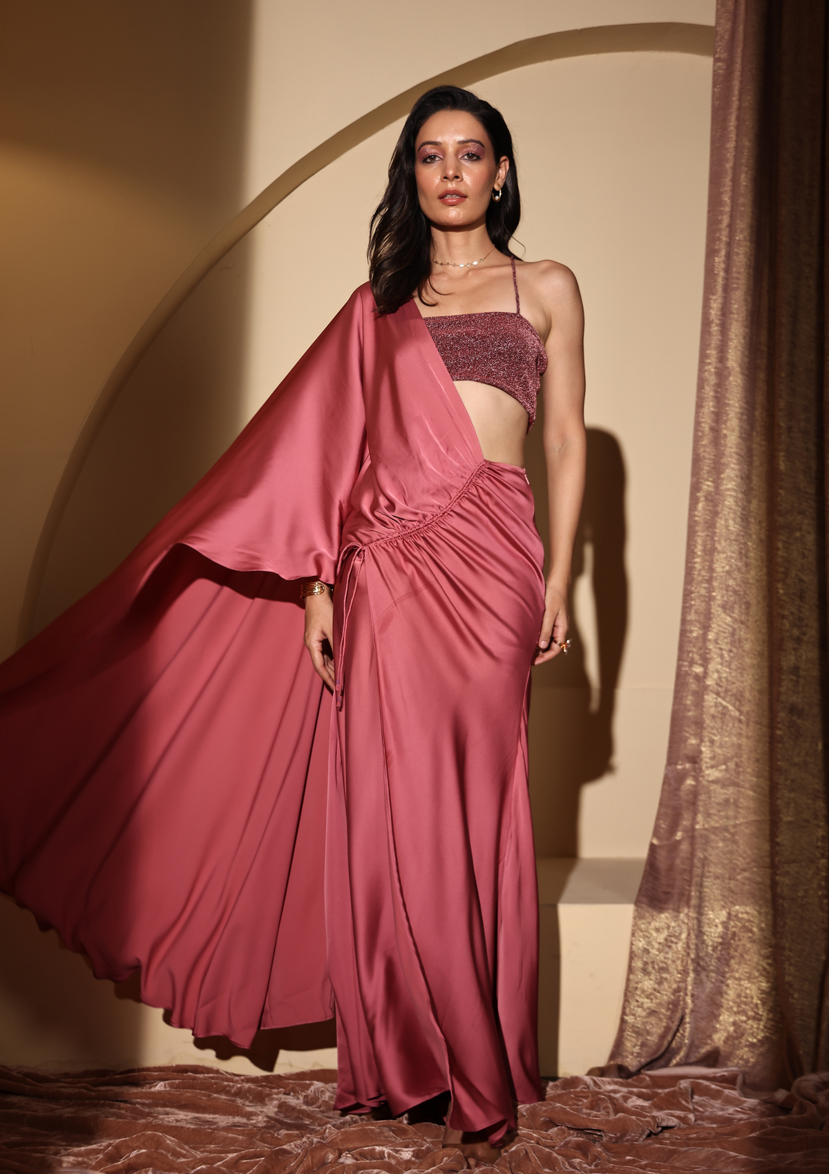 Seoraa Luxe statement-making Aqsa Saree, a modern pre-draped ensemble with a chic slit, luxurious shimmering blouse, and a sophisticated one-shoulder silhouette—perfect for cocktail nights, receptions, and fashion-forward occasions.