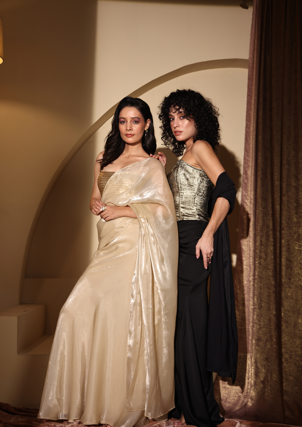 Seoraa Luxe luxury golden-black coord set featuring a shimmering golden corset top and a black draped skirt with a ruched slit—perfect for Diwali, festivals, and cocktail parties.