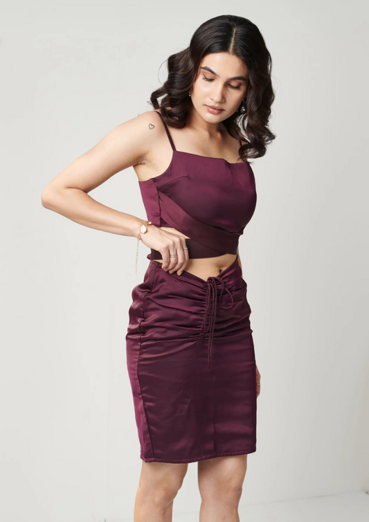 Siora red wine satin Raquel Skirt featuring sleek fabric and adjustable pull-string closure for a flattering, custom fit.