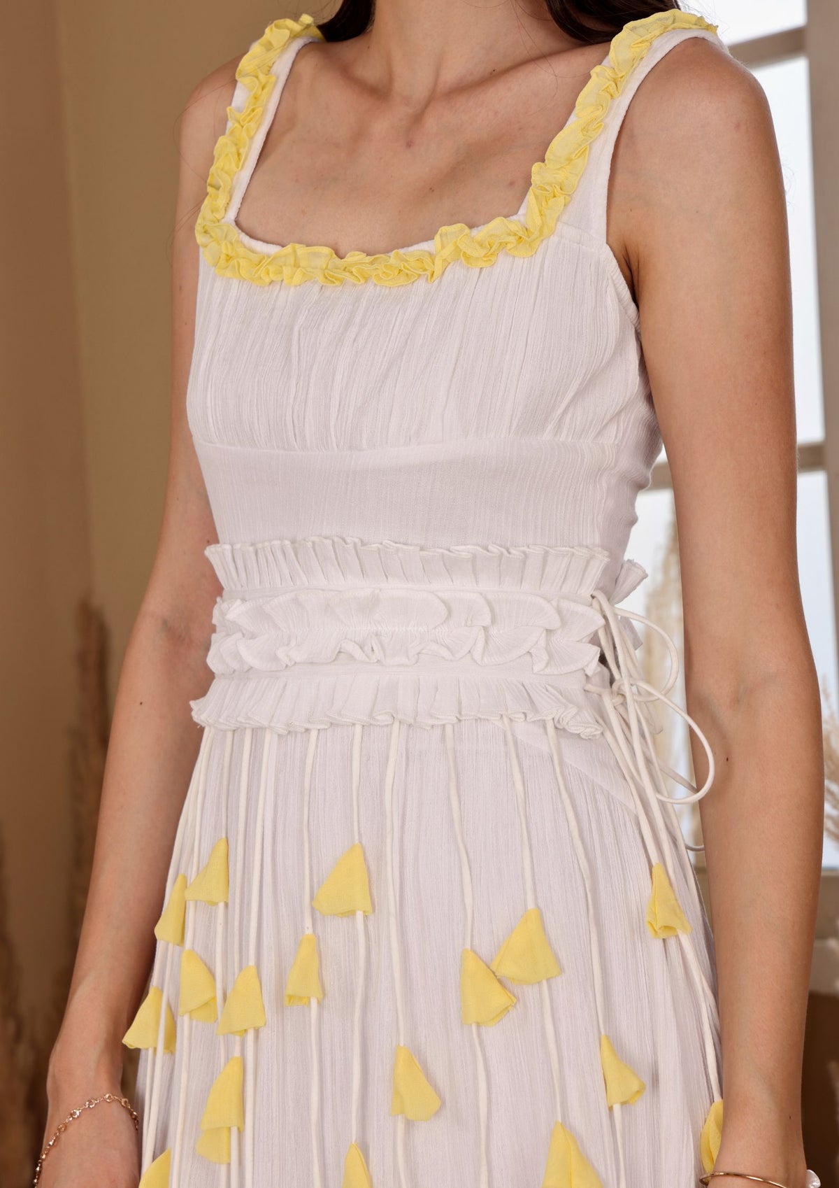 Siora Ivory Yellow Dress with gathered waist and 3D floral detail, perfect for sunset dates