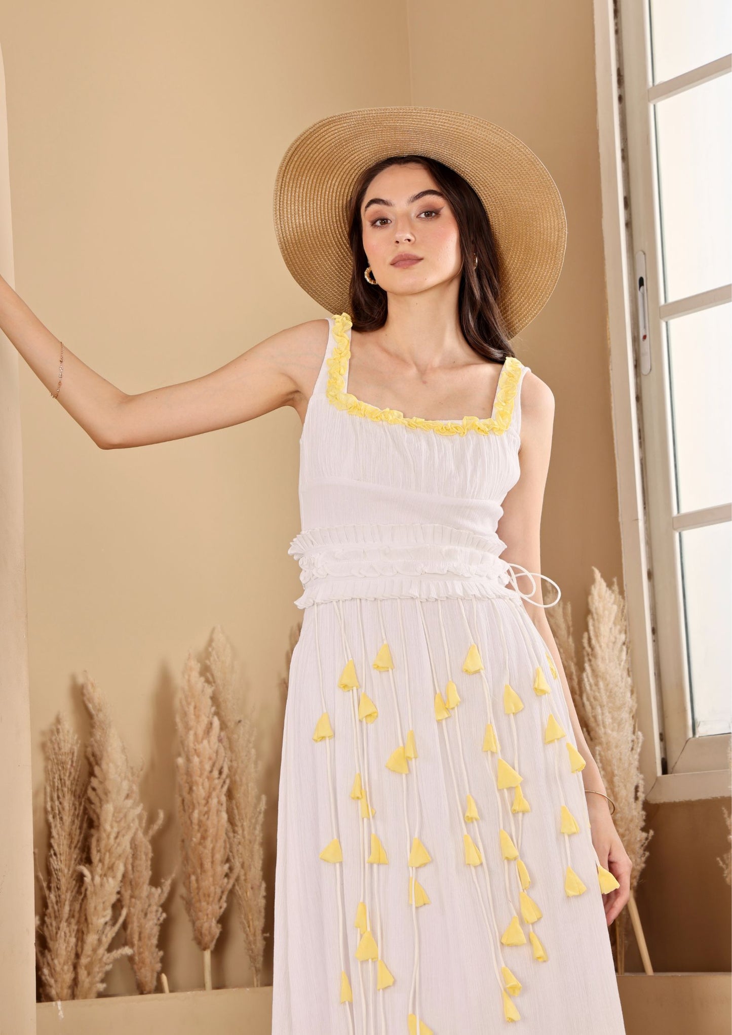 Seoraa White Yellow Dress with strappy bodice and flowing tiered silhouette, perfect for beachside evenings