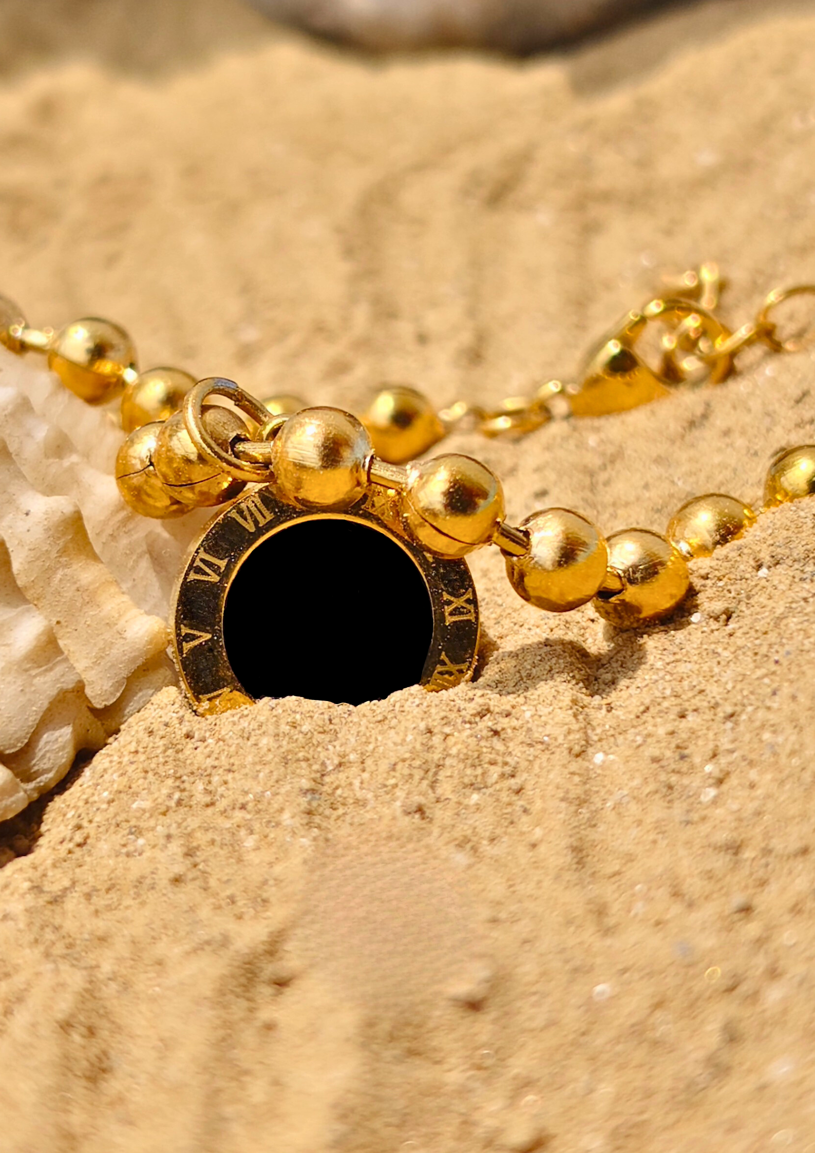 Seora: "Seora jewels Wrist of Infinity Bracelet – Waterproof, trendy, gold-plated bracelet with dual-toned clock charm, perfect as a statement everyday accessory."