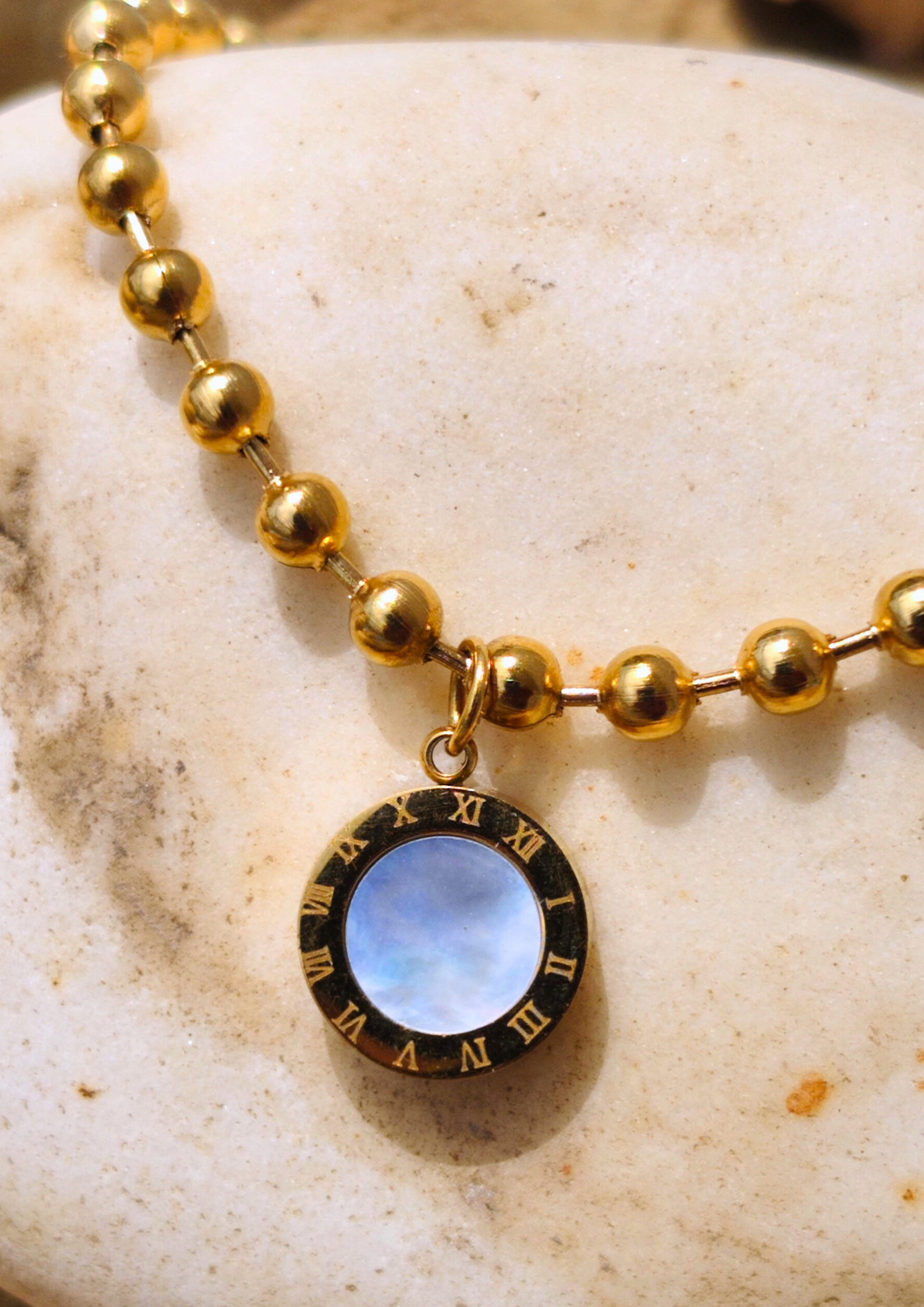 Siora: "Siora Anti Tarnish Gold Plated Wrist of Infinity Bracelet featuring black and white dual-faced charm, waterproof and trendy for everyday statement wear."