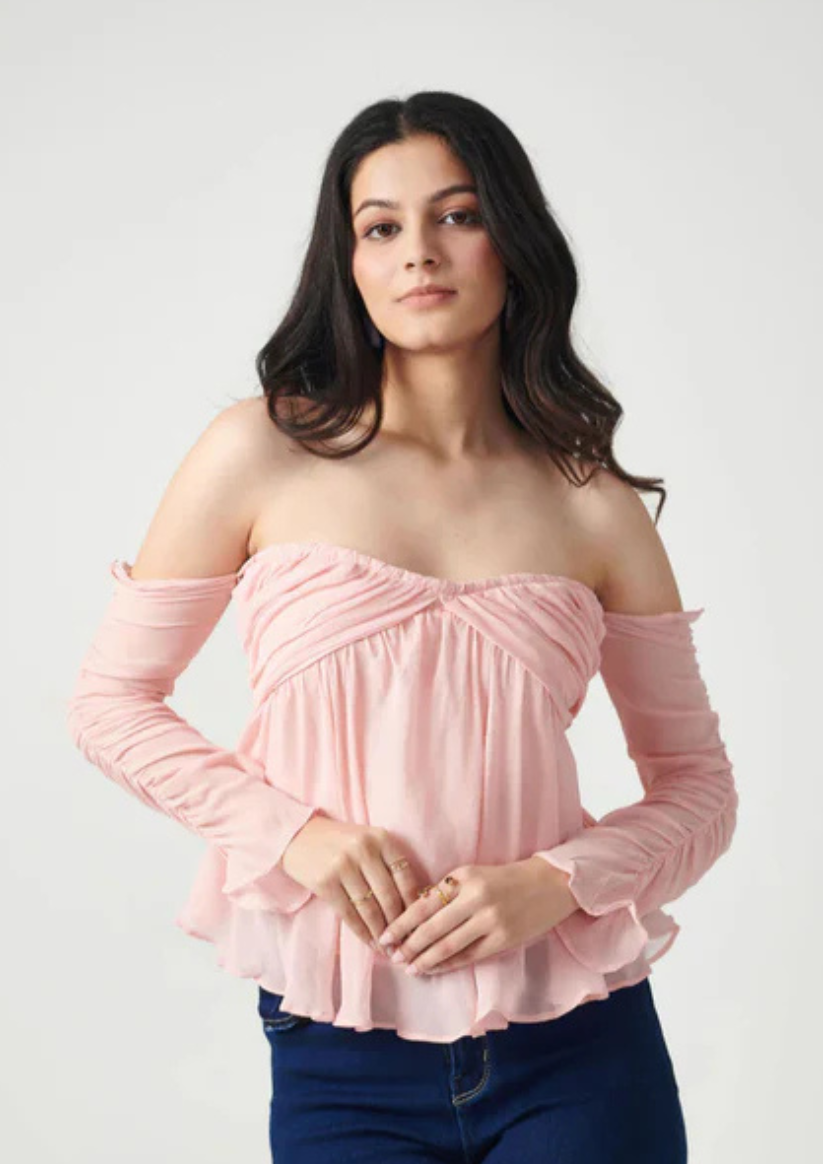 "Seoraa bright pink off-shoulder georgette top for women with pleated bust and ruched sleeves—perfect for brunch dates, vacations, birthday parties, and flirty outings.
"
