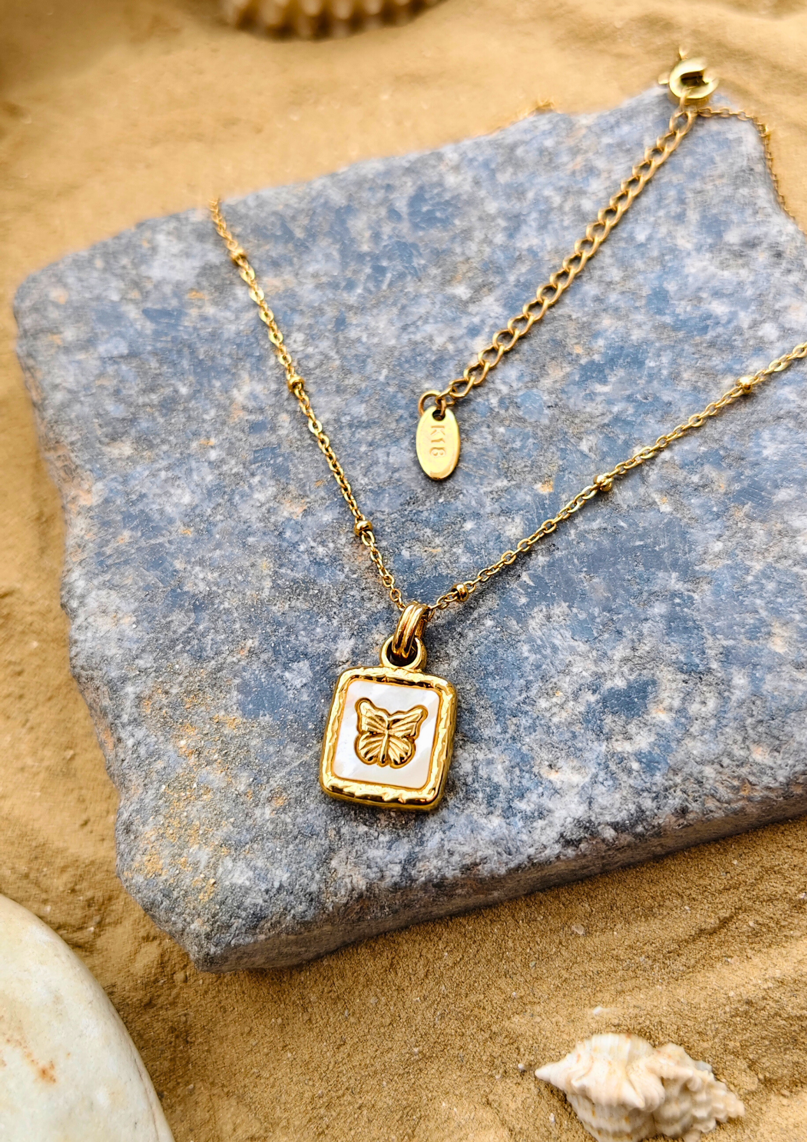 seoraa Whispering Wings Pendant – engraved butterfly gold charm with beaded chain, Seoraajewels anti tarnish gold plated statement pendant, waterproof and trendy for everyday wear.