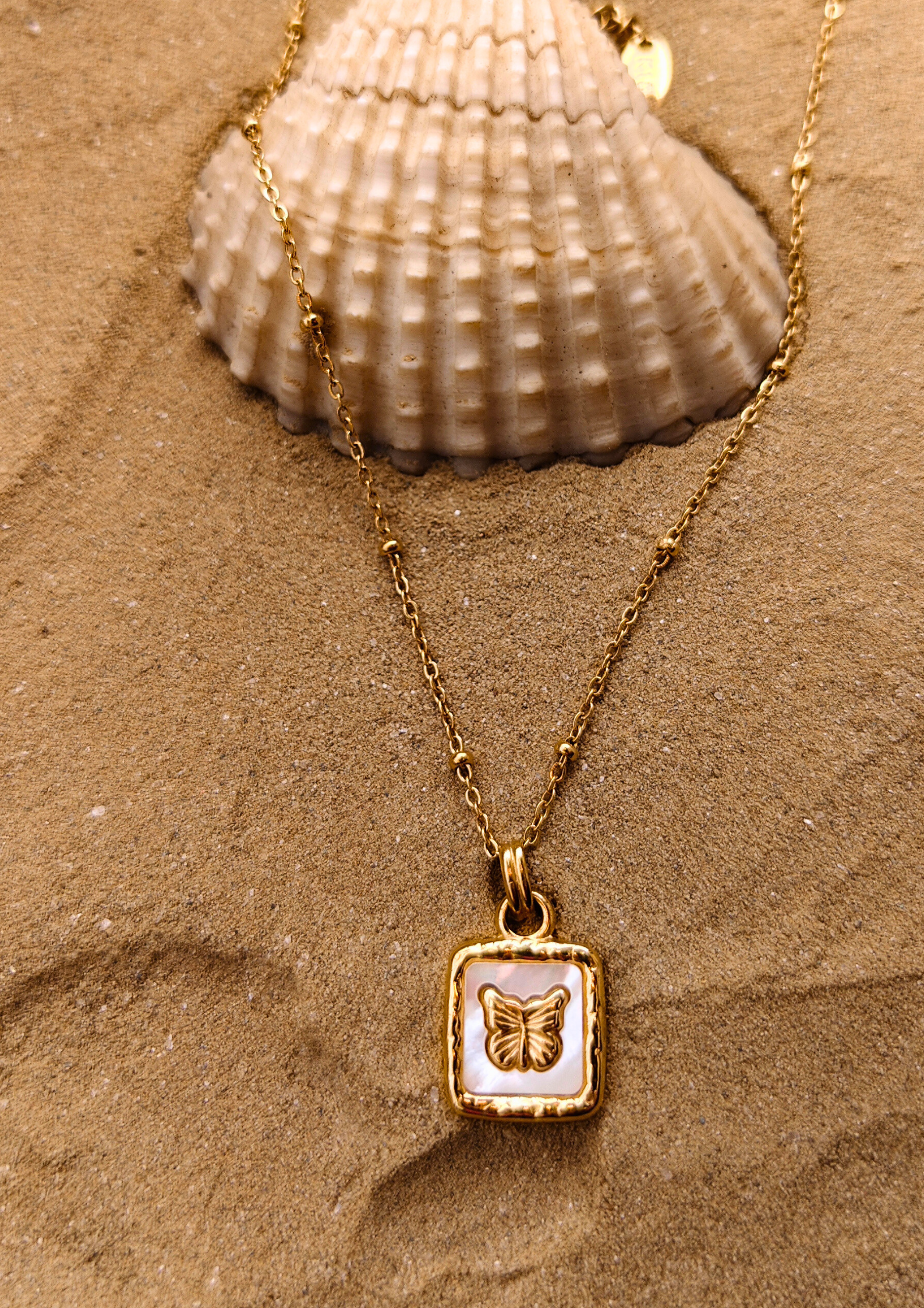 sioaa Whispering Wings Pendant – timeless butterfly engraved gold charm with delicate beaded chain, Seoraajewels anti tarnish waterproof trendy statement piece.