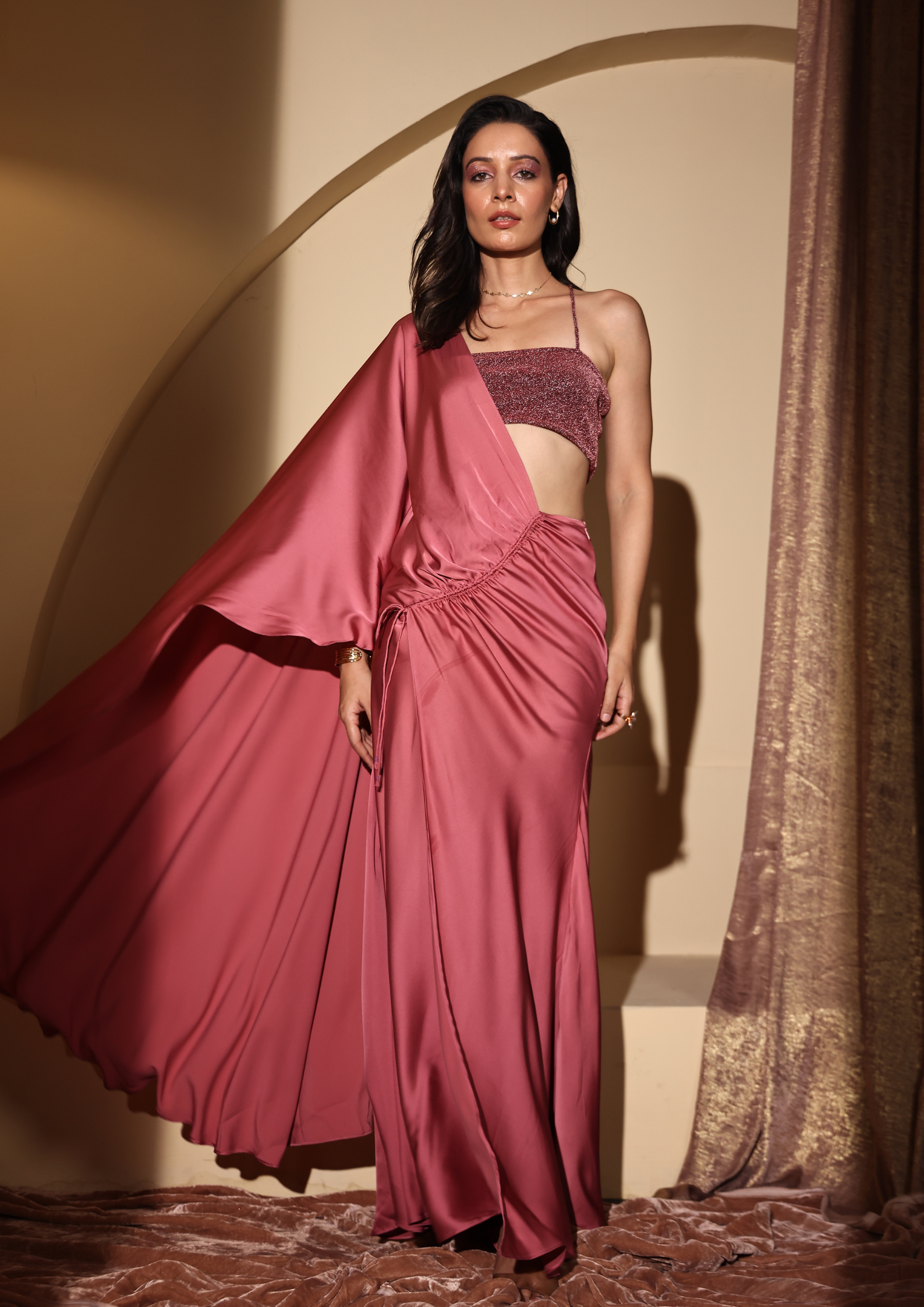 Seoraa Luxe statement-making Aqsa Saree, a modern pre-draped ensemble with a chic slit, luxurious shimmering blouse, and a sophisticated one-shoulder silhouette—perfect for cocktail nights, receptions, and fashion-forward occasions.