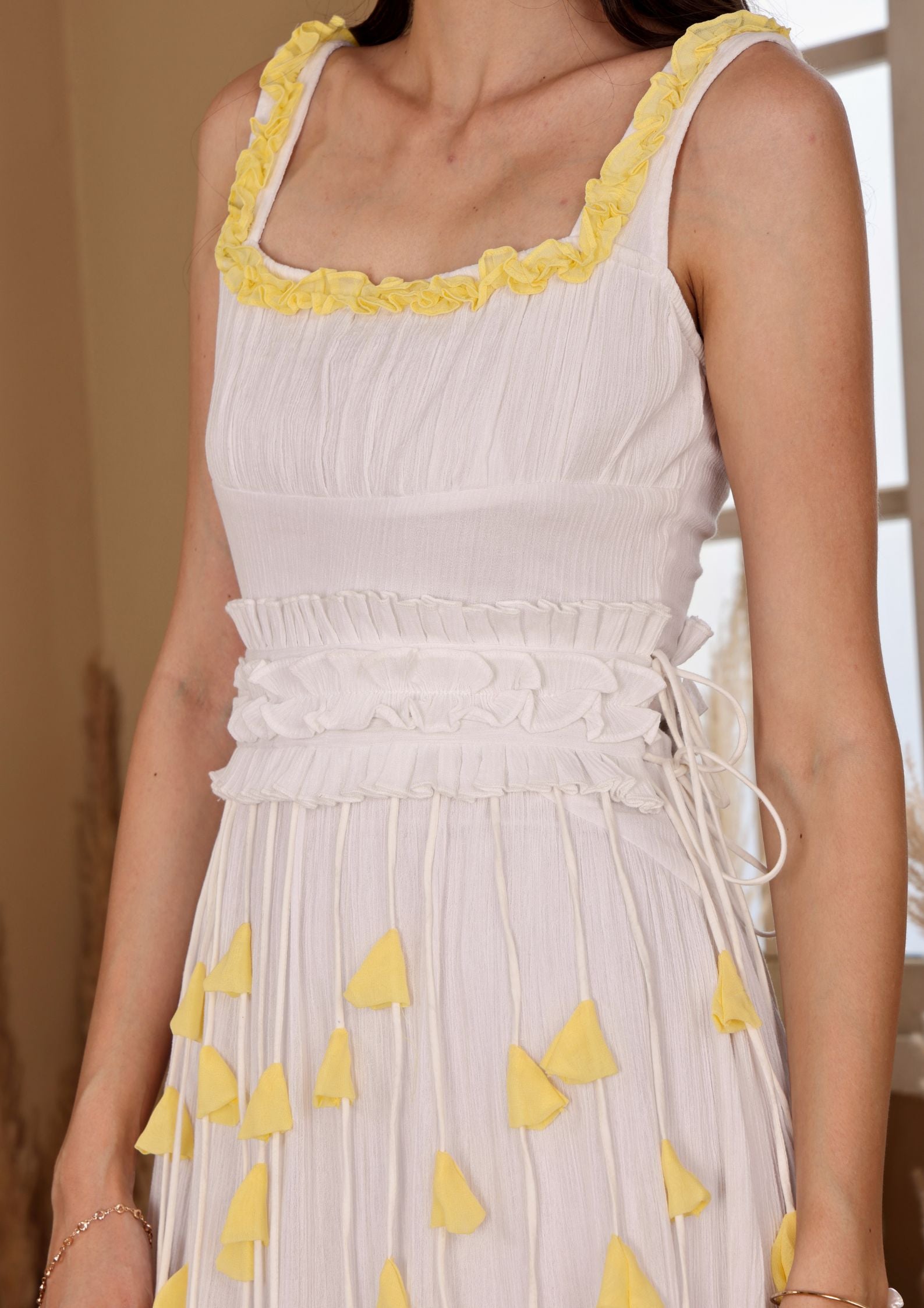 Siora Ivory Yellow Dress with gathered waist and 3D floral detail, perfect for sunset dates