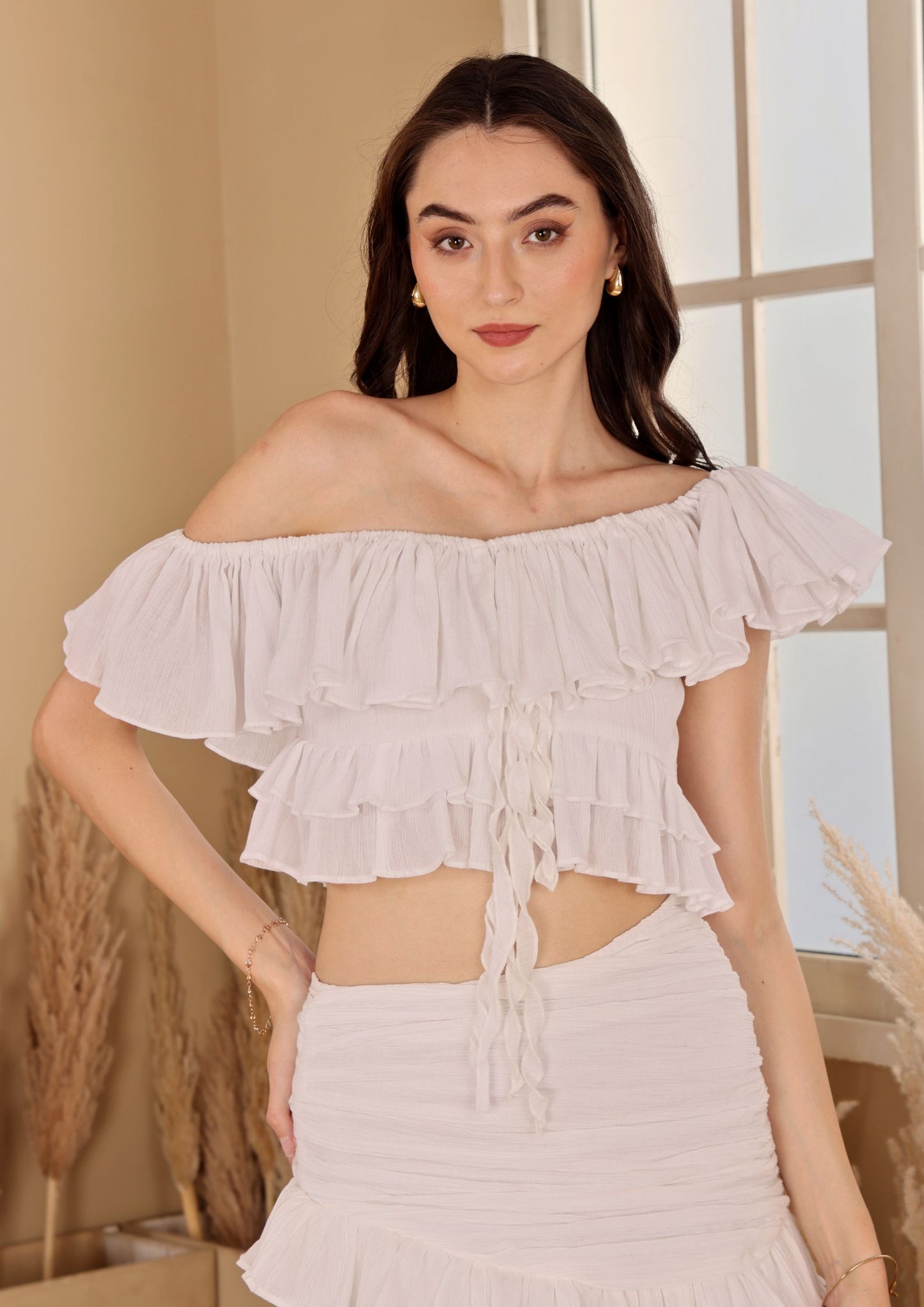 Seora White Top in crushed cotton with soft frill details, perfect for vacations