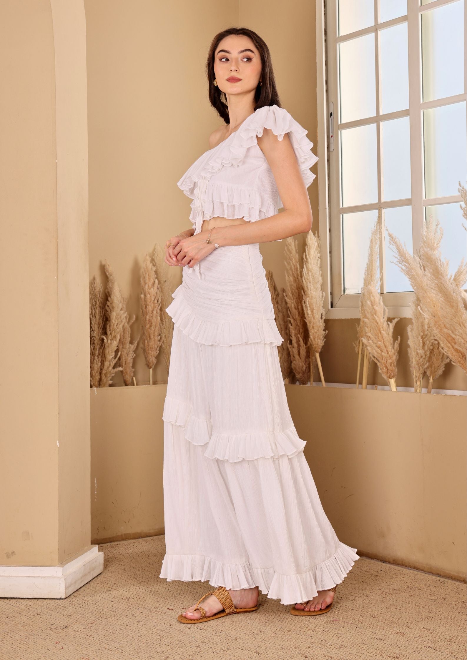 Siora Ivory Skirt with gathered frill detailing and airy movement, perfect for sunset dinners