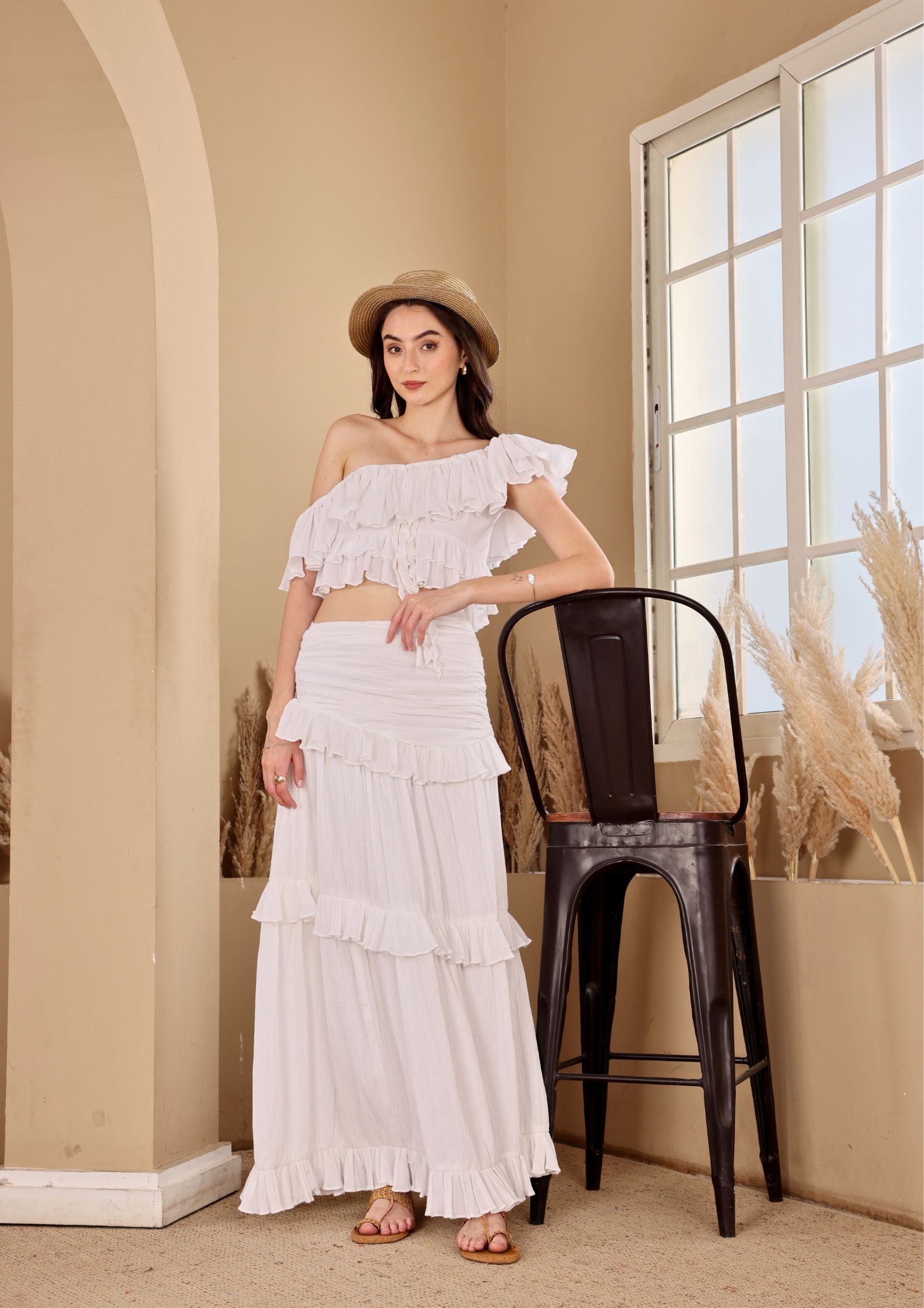 Seoraa White Co-ord Set with off shoulder ruffle top and tiered skirt, perfect for beachside moments