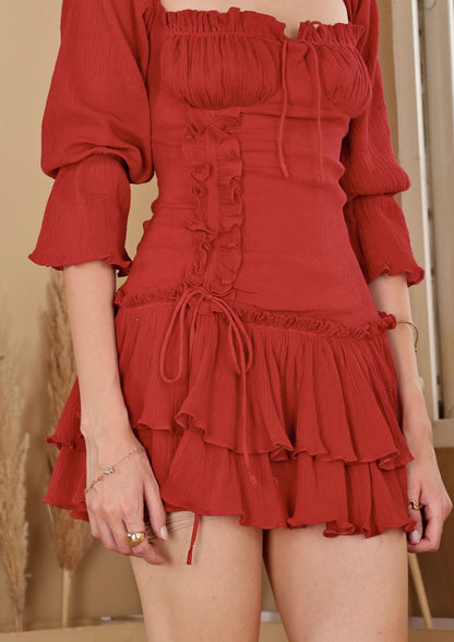 Sioraa Ruby Red Dress with layered hem and graceful ruching, perfect for special occasions