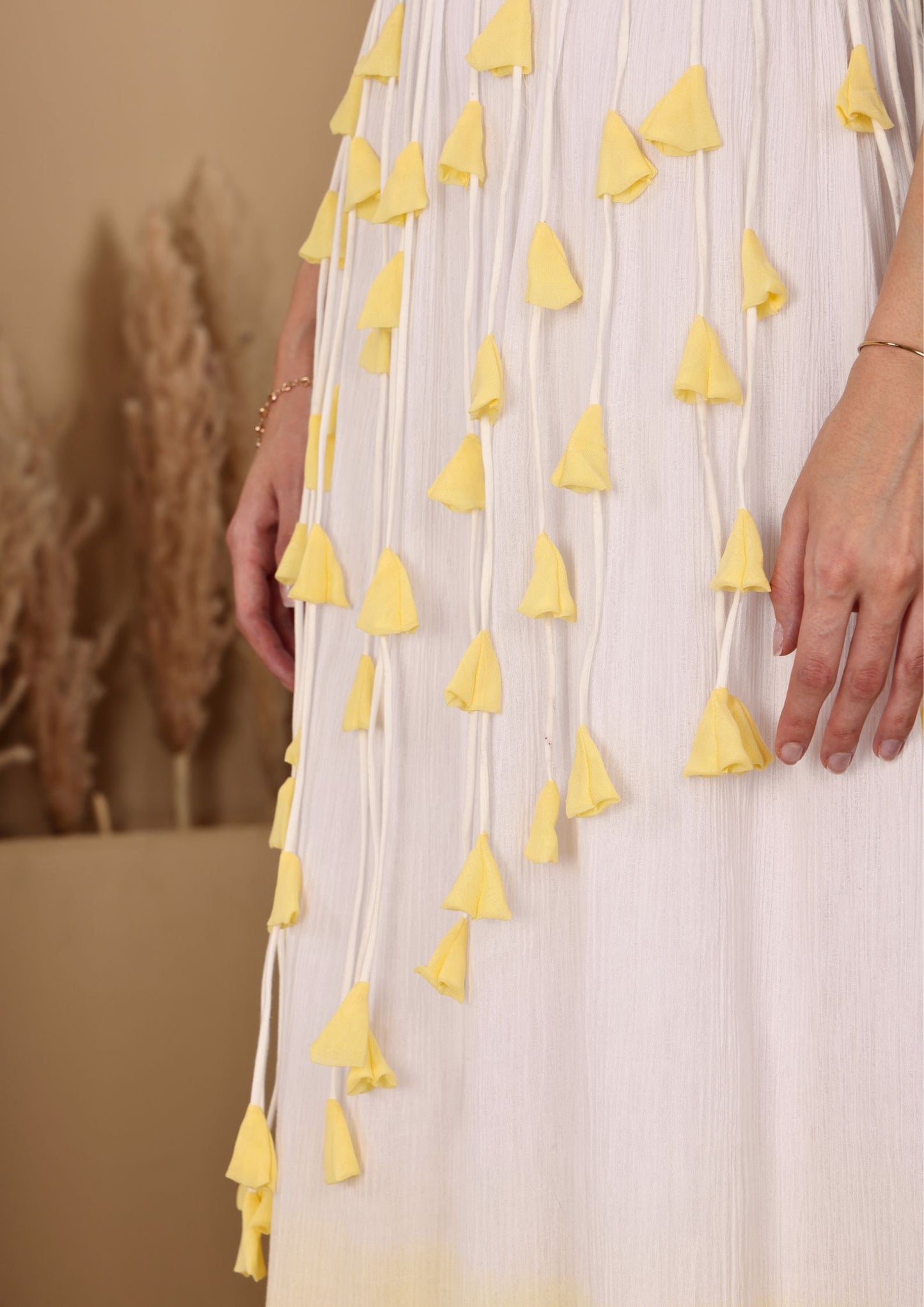 Sehora White Yellow Dress with romantic floral accents and elegant fit, perfect for resort wear