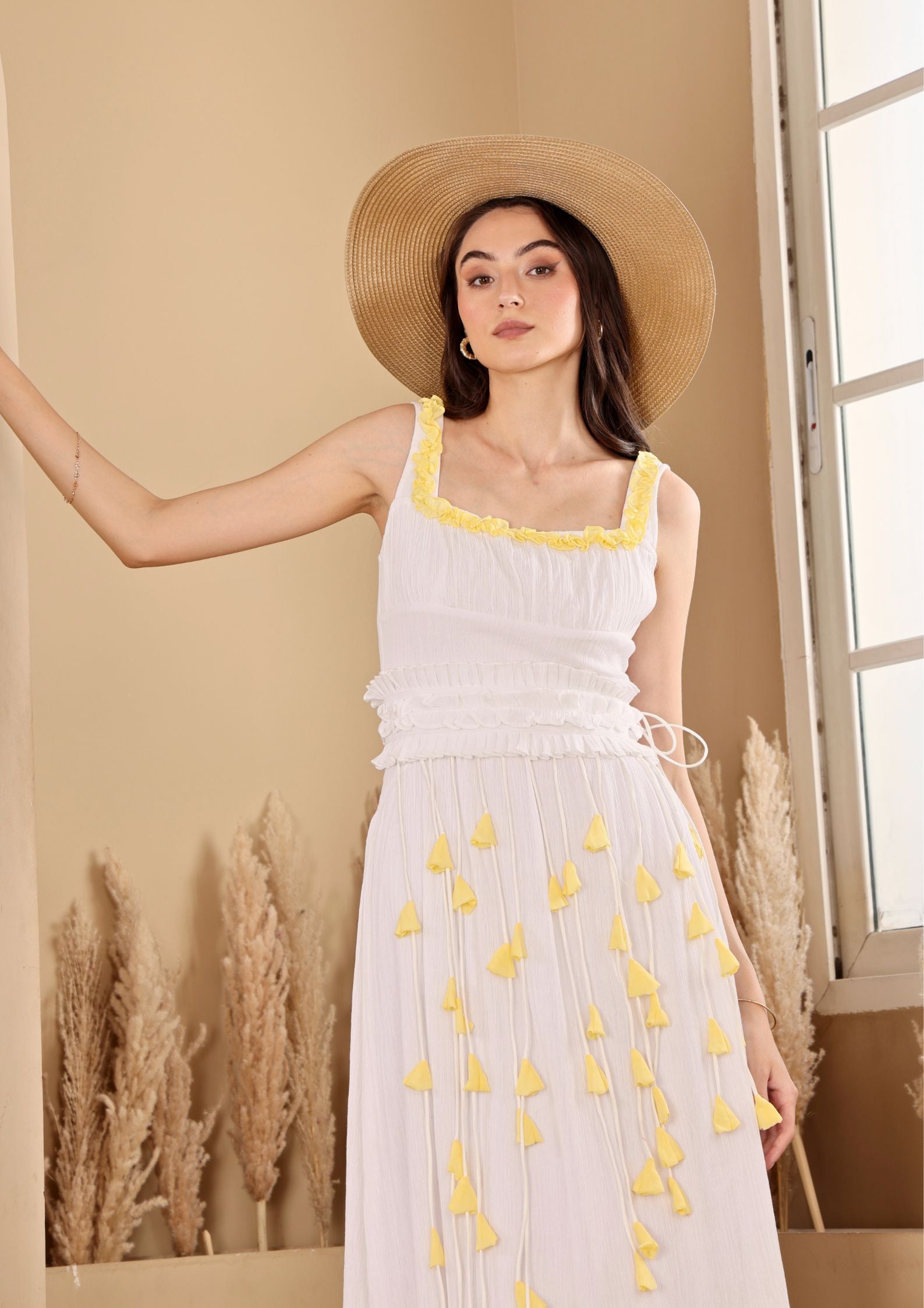 Seoraa White Yellow Dress with strappy bodice and flowing tiered silhouette, perfect for beachside evenings