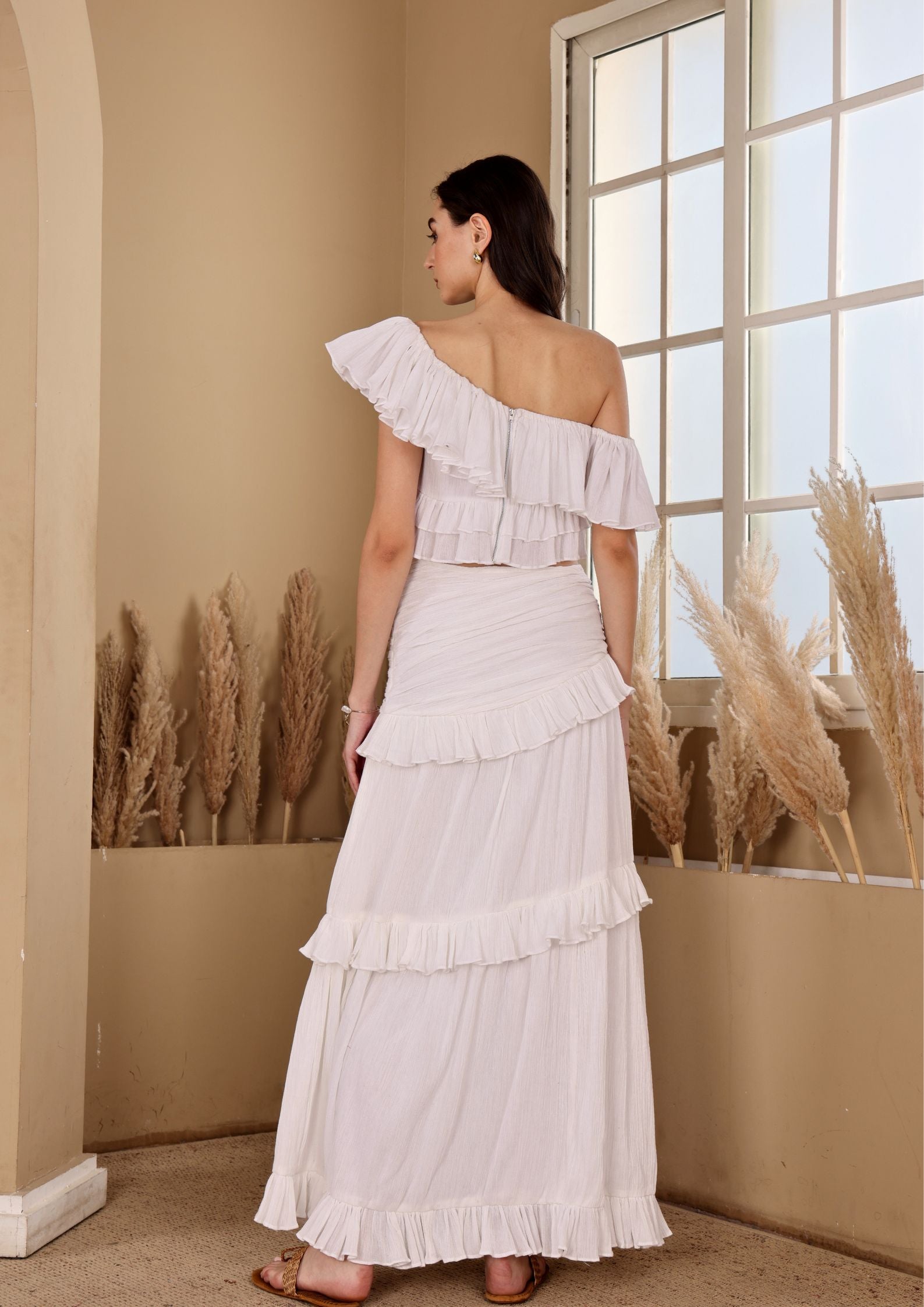 Seoraa White Co-ord Set with off shoulder ruffle top and tiered skirt, perfect for beachside moments