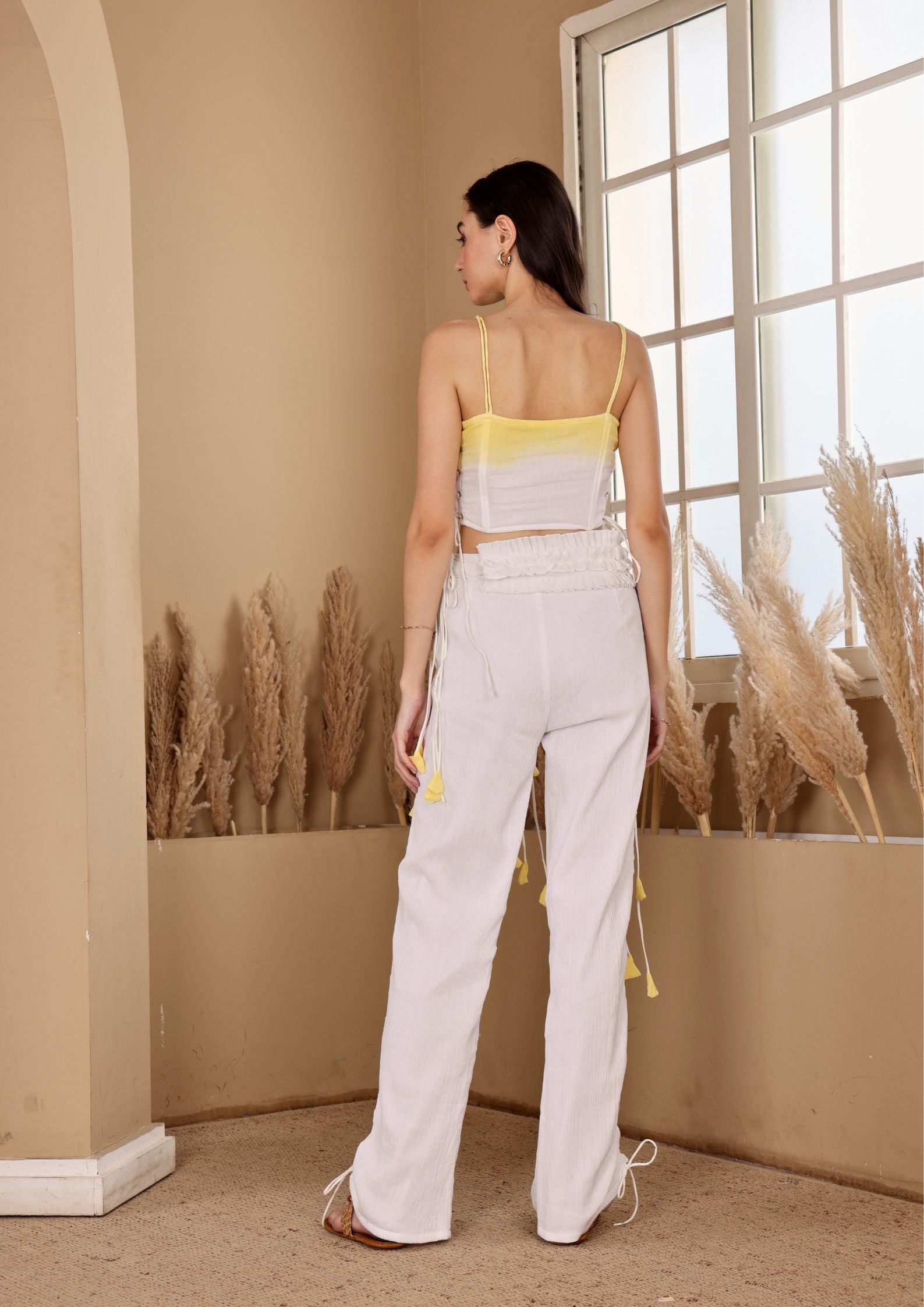Seora White Yellow Set in crushed cotton with feminine silhouette, perfect for vacations