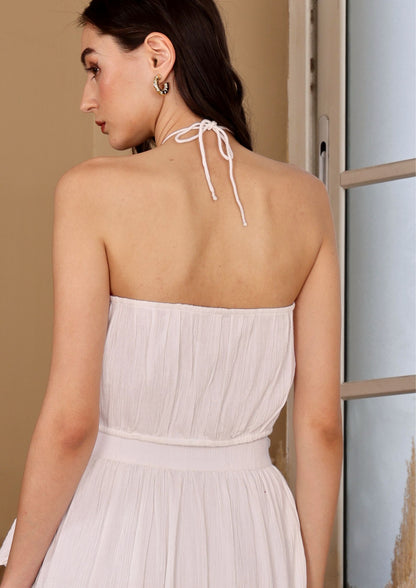 Seora White Top in crushed cotton with feminine silhouette, perfect for vacations